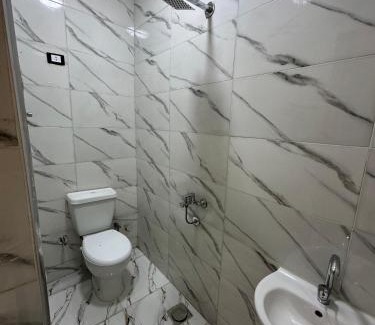 6th of October City Hotel | الحي الاول المجارة8