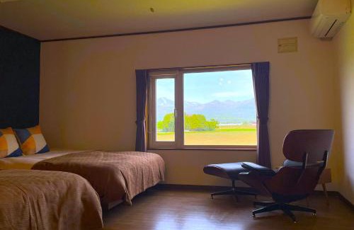 Furano House | 大人数の家族旅行に！BBQ/シアタールーム/カラオケ/日本庭園