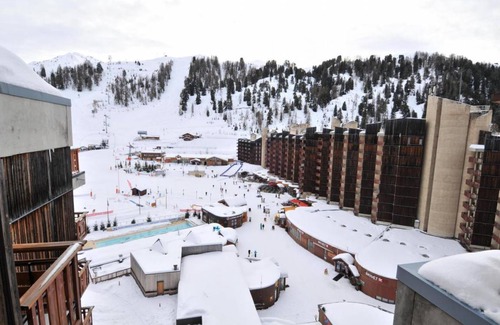Macot-la-Plagne Apartment | 100m from ski slopes, 9th floor, view ski slopes, swimming pool, balcony, tv, ski locker, 35m²