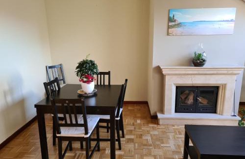 Distrito Oeste Apartment | 106A Ático con garaje y chimenea cerca de la playa