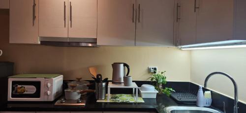 Pinagsama Apartment | 12e Spacious Cozy Suite at The Venice Mall with FREE Parking and Washing Machine