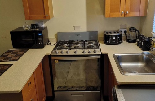 Spring Village House | 2-Bed, Sleeps 4, Private Garden, Parking