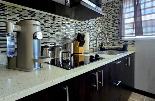 Sabana Abajo Condo | 2-bedroom condo in charming Carolina with WiFi, AC. 4 min walk to beach!
