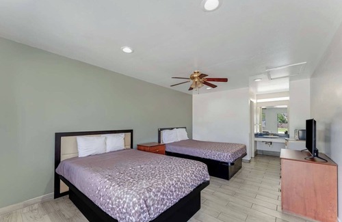 Eastside Promise Neighborhood Hotel | 2 Family-Friendly Rooms Near DT Entertainment Venues w/Free Breakfast