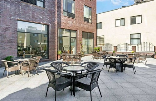 Flushing Chinatown Hotel | 2-Star Hotel ∙ Ramada by Wyndham Flushing Queens