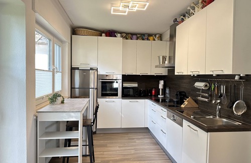 Nonnenhorn Apartment | 240 m² Ferienwohnung direkt am Bodensee mit privatem Strand und Fasssauna