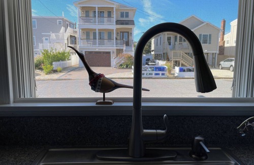 Ship Bottom Condo | 3-bdrm condo in Ship Bottom. 1 block from beach and bars. Surfboards included!