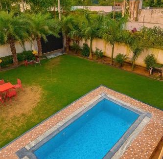 Jaipur District House | 3 BHK Farm with 2 jacuzzi, Pool, Lawn & Mountain View