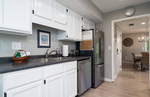 Spinnaker Beachhouses House | 3 BR, 2 BA Spinnaker Beach House! Close to Beach Club! Golf Course Views! Dog (2) Friendly!