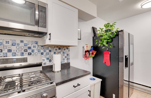 Hackensack River Waterfront Condo | 3 Mi to Liberty State Park: Artsy West Side Condo