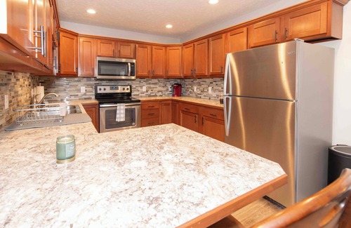 Kearney House | 30+ Day Lease, Fully Furnished, Entire Unit with Attached Garage, Fenced-In Yard