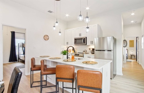Near East Side Apartment | 3br-2ba Cityscape Haven With Panoramic Tower View