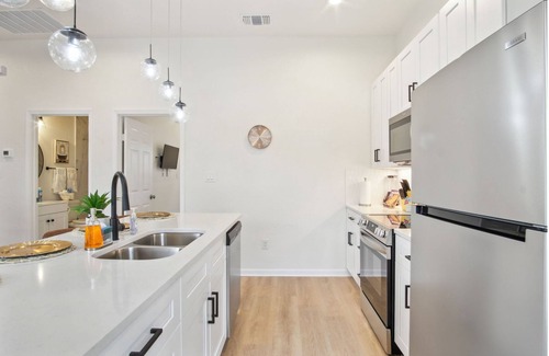 Near East Side Apartment | 3br-2ba Cityscape Haven With Panoramic Tower View
