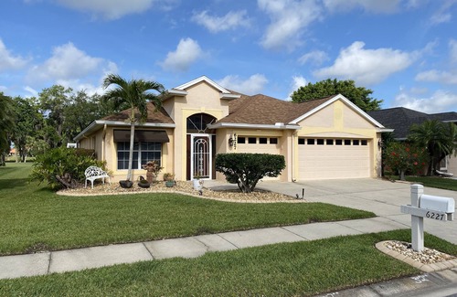 Imperial Lakewood's House | 4 Bedroom house with a heated pool on a public golf course