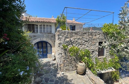 Livadi House | 4 bedroom stone villa with pool and sea views in the Peloponnese, Greece