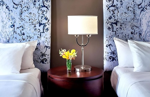 West Plaza Hotel | 4 Comfortable Units! Onsite Pool, Pets Allowed, Near Nelson-Atkins Museum of Art