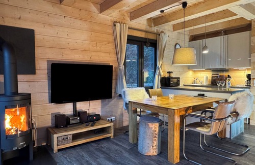 Hahnenklee Ski Chalet | 5 * log cabins with sauna, fireplace, terrace, barbecue etc. in alpine chalet style