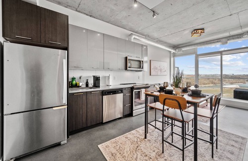 East Village Apartment | 5 min Walk to Saddledome | King Bed | Sofa Bed | AC | Beside Fort Calgary
