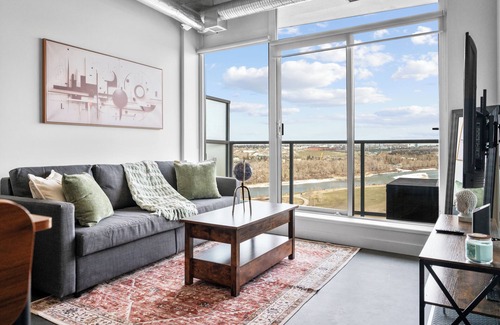 East Village Apartment | 5 min Walk to Saddledome | King Bed | Sofa Bed | AC | Beside Fort Calgary