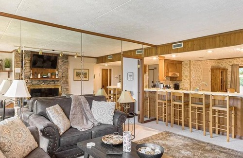 Chalet Village Apartment | 5 Star 3 bd 3ba Serenity Views w Pool Fireplace