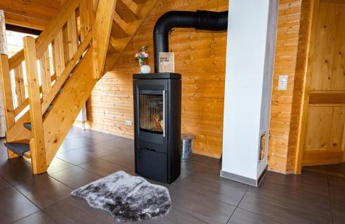 Rieden House | 5 Sterne Ferienhaus Tommy mit Kamin, Seeblick und großer Terrasse