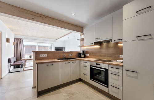 Bichlbach Apartment | 50m² modern holiday apartment with balcony, free swimming lake, 100 m from the ski area