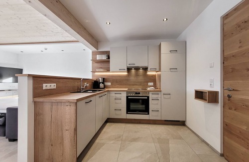 Bichlbach Apartment | 50m² modern holiday apartment with balcony, free swimming lake, 100 m from the ski area