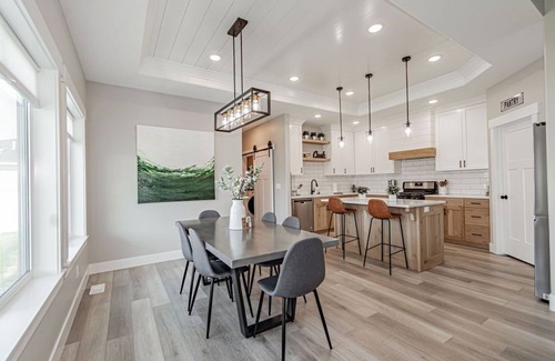 Idaho Falls House | 6 bed 3 bath home ~ sleeps 20! w/game room, fireplace, hot tub & playground.