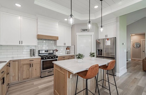 Idaho Falls House | 6 bed 3 bath home ~ sleeps 20! w/game room, fireplace, hot tub & playground.