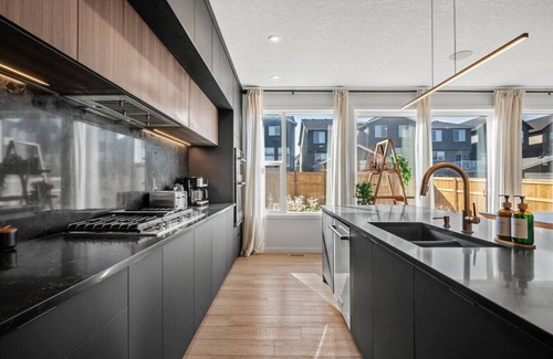 Calgary House | 7 BR Luxury Home » Central AC » 100` Projector