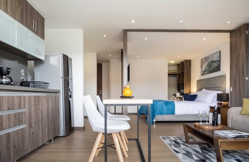 Barrios Unidos Condo | 72Hub Apartments by Jalo