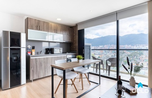 Barrios Unidos Condo | 72Hub Apartments by Jalo