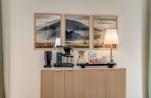 Oakley House | A designer forest retreat near Asheville—hot tub under the trees, fire pit nights, artisan coffee bar mornings, and luxe comfort in the Land of the Sky.