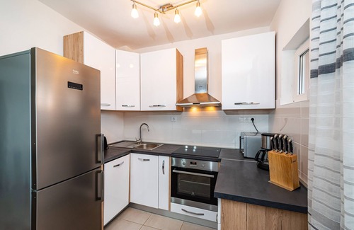 Nin Apartment | a few minutes from the gently sloping sandy beach, child-friendly, quiet, well-kept