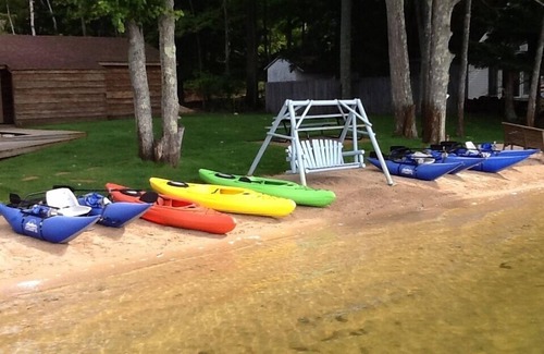 Traverse City Cottage | A Lakeside Delight w/PRIVATE Beach & Dogs Welcome