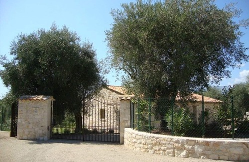 Les Maillans House | A stone farmhouse in the countryside surrounded by olive trees