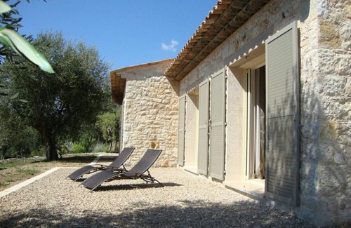 Les Maillans House | A stone farmhouse in the countryside surrounded by olive trees