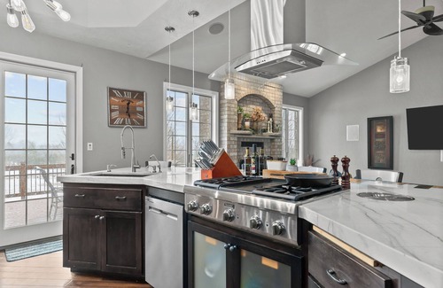 Forest Junction House | A warm & inviting modern retreat featuring on-site local brews & a home theater.