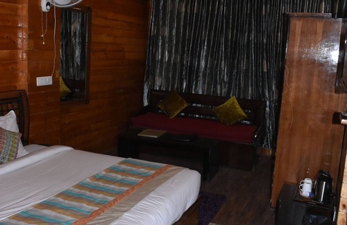 Khajjiar Hotel | Aanantham Country Resort