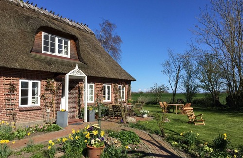 Gelting House | Absolute peace: Detached thatched house with huge garden, pool, sauna .
