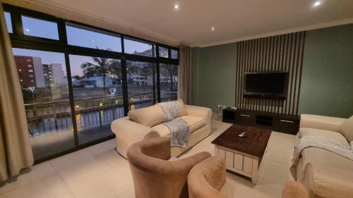 Durban Point Apartment | Accommodation Front - Homely 6 Sleeper with Canal Views near the Beach