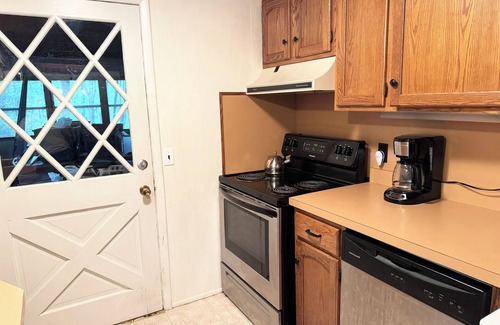 Hawley Cabin | Adorable Gingerbread Style cabin in gorgeous amenity filled lake/pool community