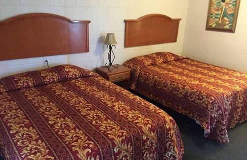 Fairview Hotel | Affordability Meets Comfort at Knights Inn Fairview! 4 Great Units, Free Parking