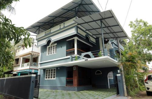 Guruvayur Apartment | Akasha Nila Heavens 2 BHK Homestay - Top floor