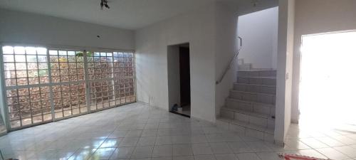Gurupi House | Aluguel de quarto em residência