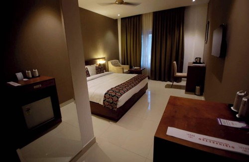 Irinjalakuda Hotel | Ambal Regency
