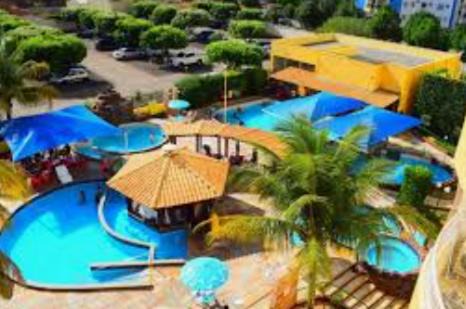 Prive das Caldas Apartment | Apartamento para até 5 pessoas quarto andar com vista para piscinas 413