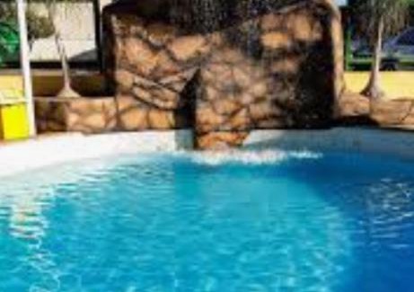 Prive das Caldas Apartment | Apartamento para até 5 pessoas quarto andar com vista para piscinas 413