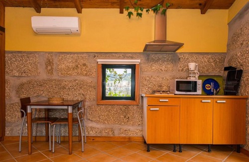 Beijos Apartment | Apartment 'Casa De Andrães Loft Heras' with Shared Pool, Wi-Fi and Air Conditioning