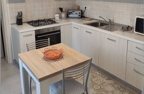 Palau Apartment | Apartment 'Casa Vacanza Mirto' with Mountain View, Wi-Fi and Air Conditioning